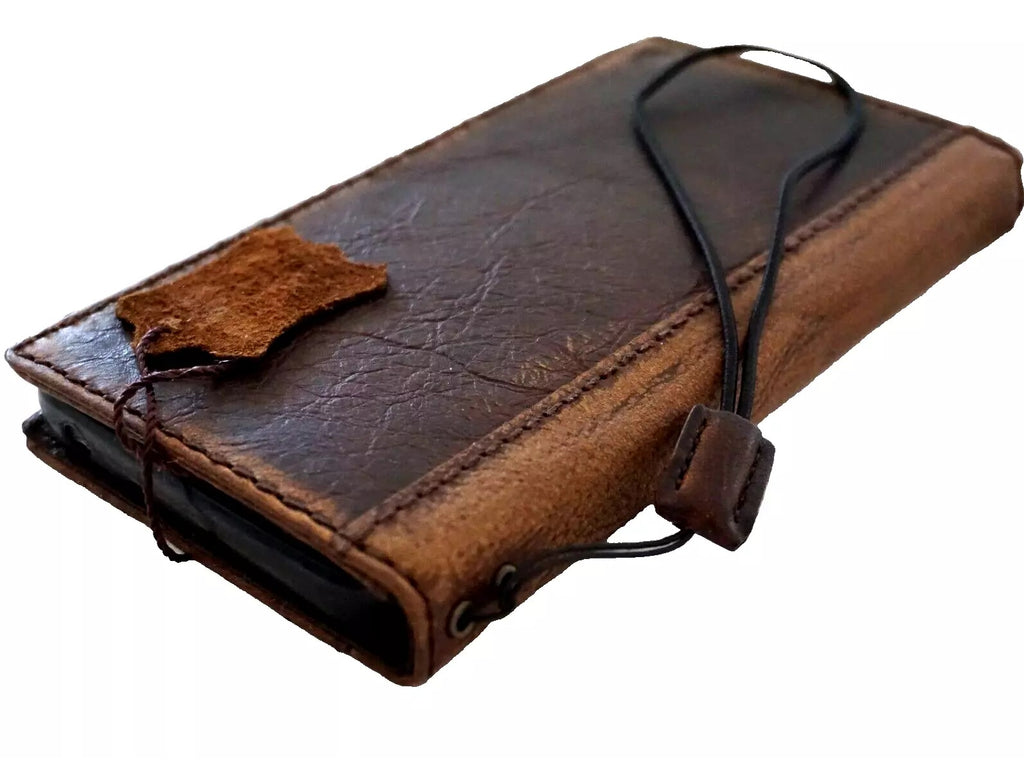 Genuine leather Google Pixel case by DAVISCASE featuring a luxurious book wallet design with a polished stone finish.