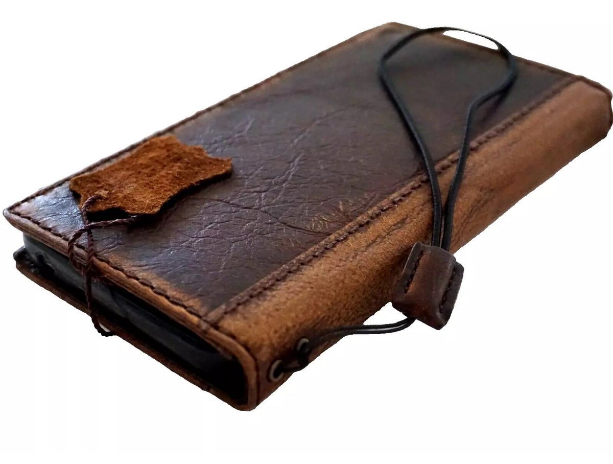 Genuine leather Google Pixel case by DAVISCASE featuring a luxurious book wallet design with a polished stone finish.