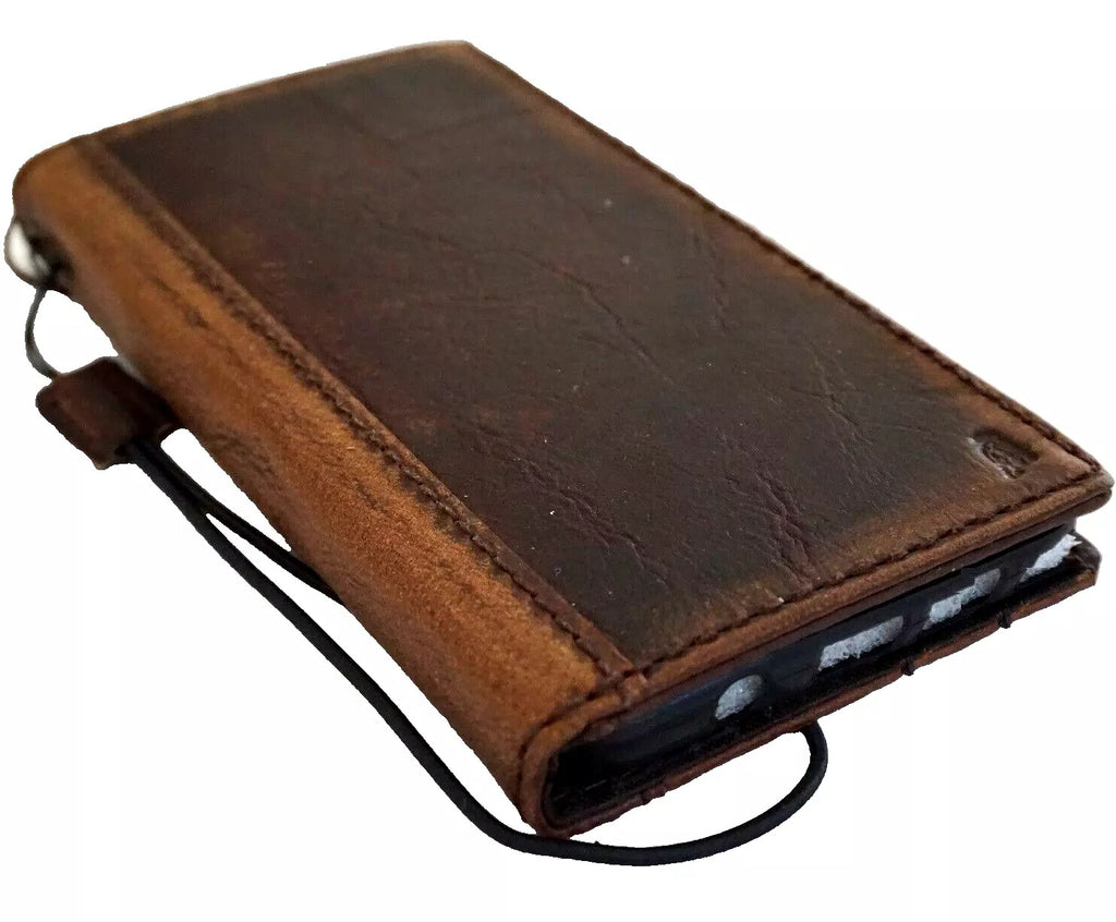 DavisCase genuine leather Google Pixel phone case with book wallet design, luxurious stone polish finish, compatible with Pixel 10, 6, 7, 8, 9 models