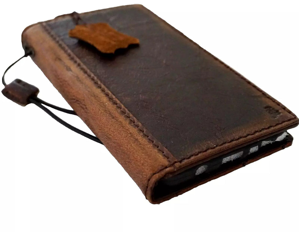 Handmade genuine leather phone case for iPhone 12-16 Pro Max, SE, and 8 Plus by DAVISCASE, featuring a wallet and book-style design.