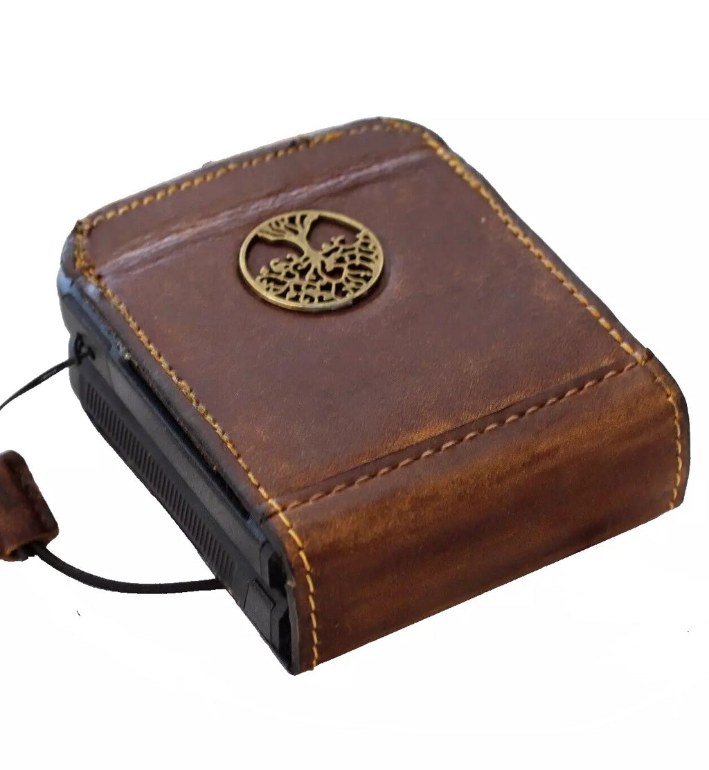 Handmade genuine leather phone case for Galaxy Z Flip series with vintage flip cover featuring a Mini Tree of Life design by DAVISCASE.