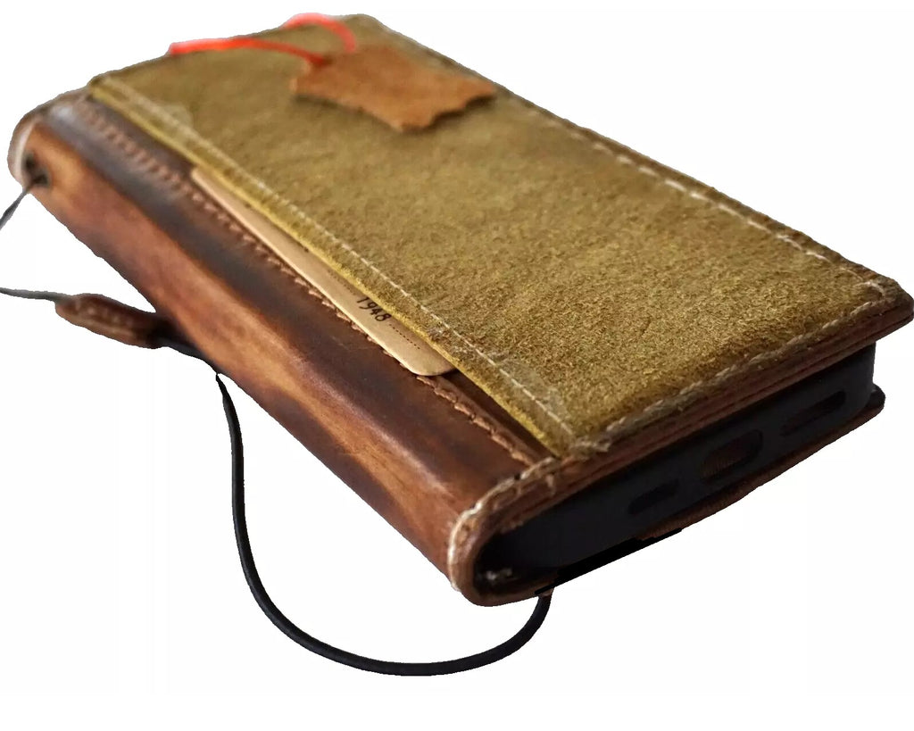 Green genuine leather fold wallet case for Google Pixel phones, handcrafted by DAVISCASE with sewn detailing.