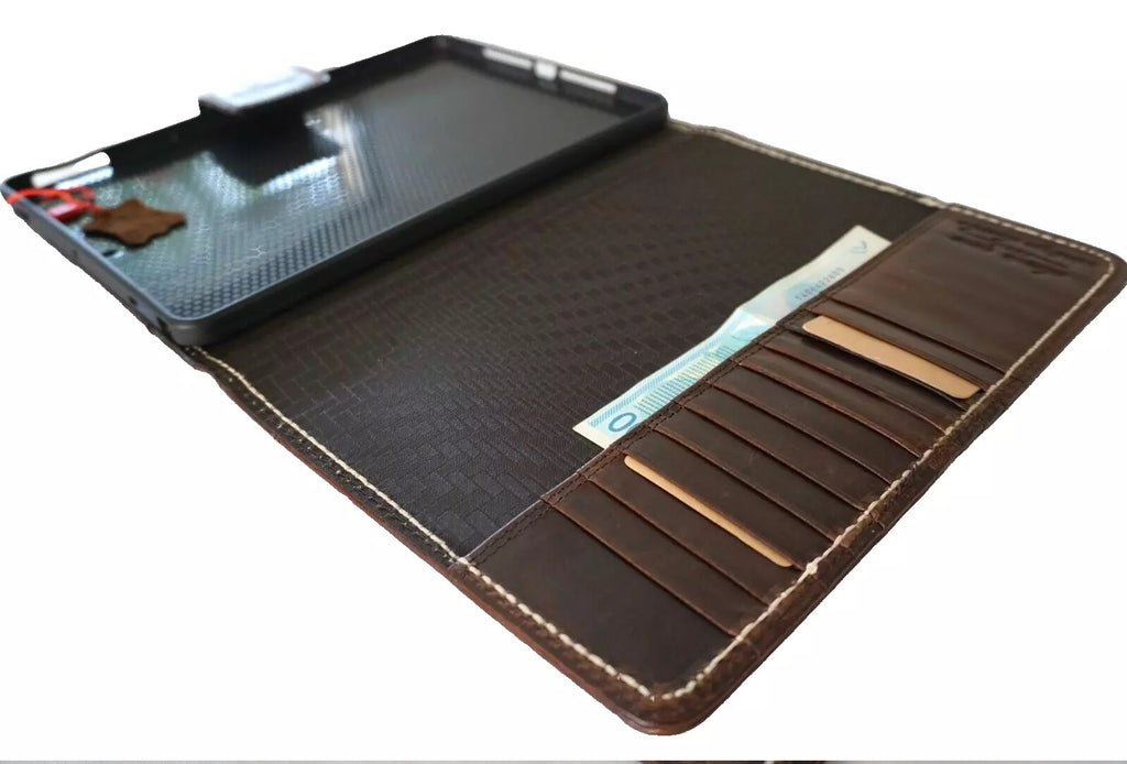 Genuine leather iPad case for 10.2, 10.5, 10.9, 11, and 13 Pro models showing textured brown leather with thick seams.
