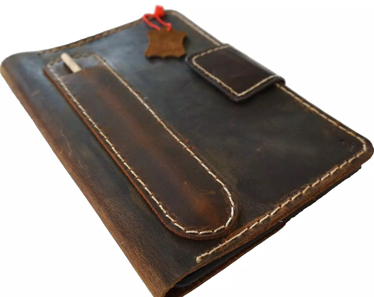 Handmade genuine leather case for Apple iPad Mini 6 5 4 3 Pro by DAVISCASE, with a built-in pen holder and premium craftsmanship.