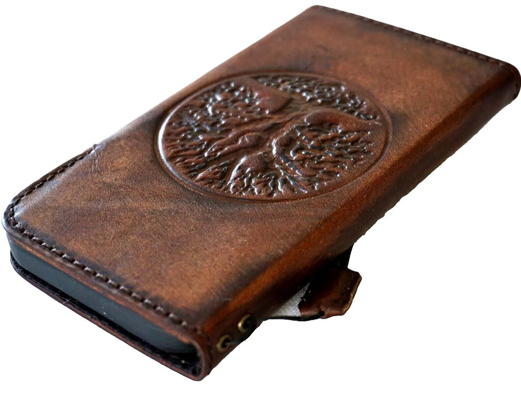 Genuine leather Google Pixel 7 Pro case by DAVISCASE with Tree of Life design, magnetic closure, wallet style, and wireless charging compatibility.