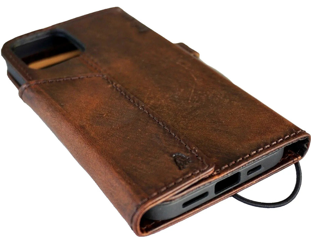 Handcrafted leather phone case by DAVISCASE for iPhone models, featuring vintage Tree of Life design and magnetic closure.