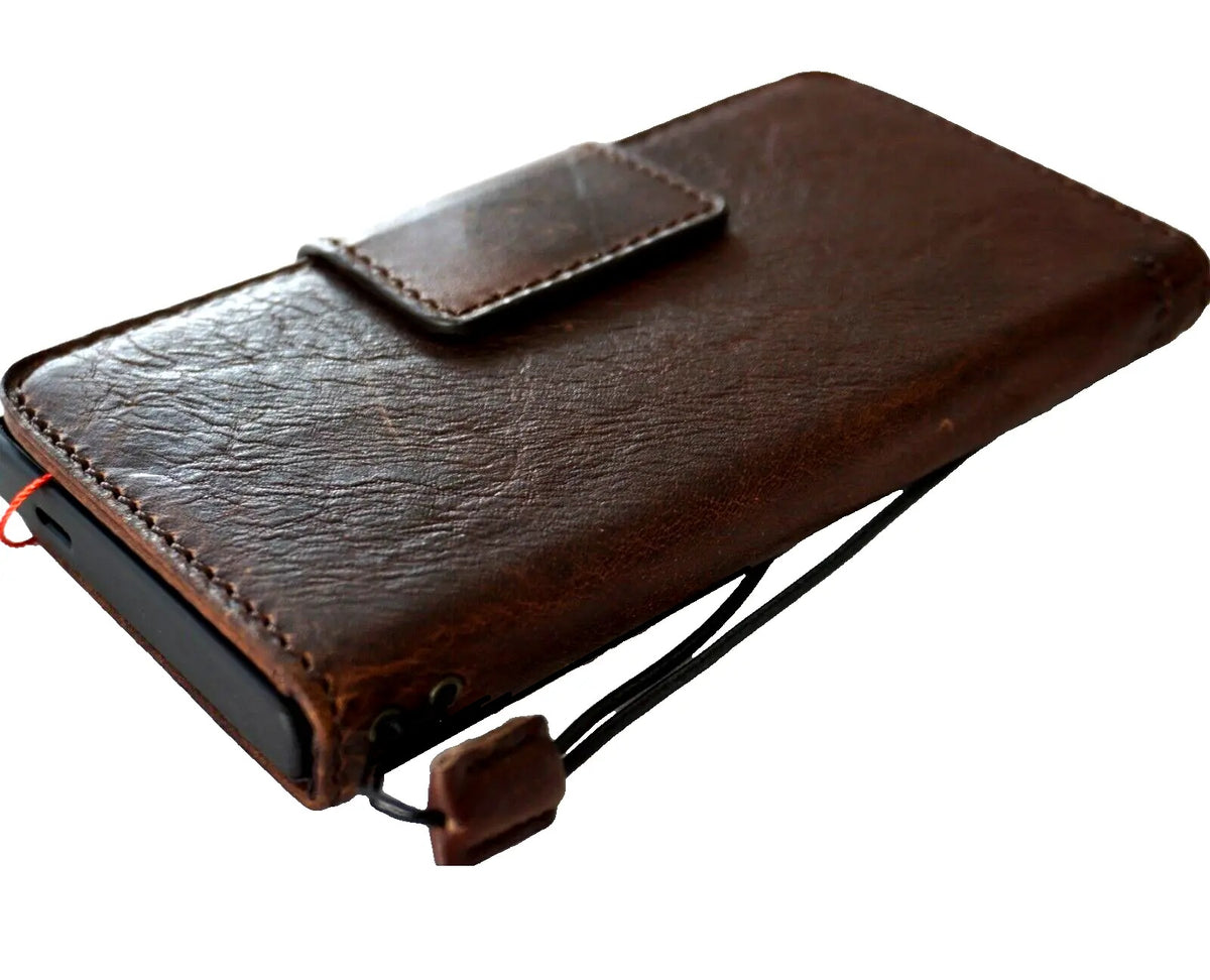Handmade dark brown leather Samsung Galaxy S24 Ultra case with wallet design, rubber holder, magnetic closure, and wireless charging.