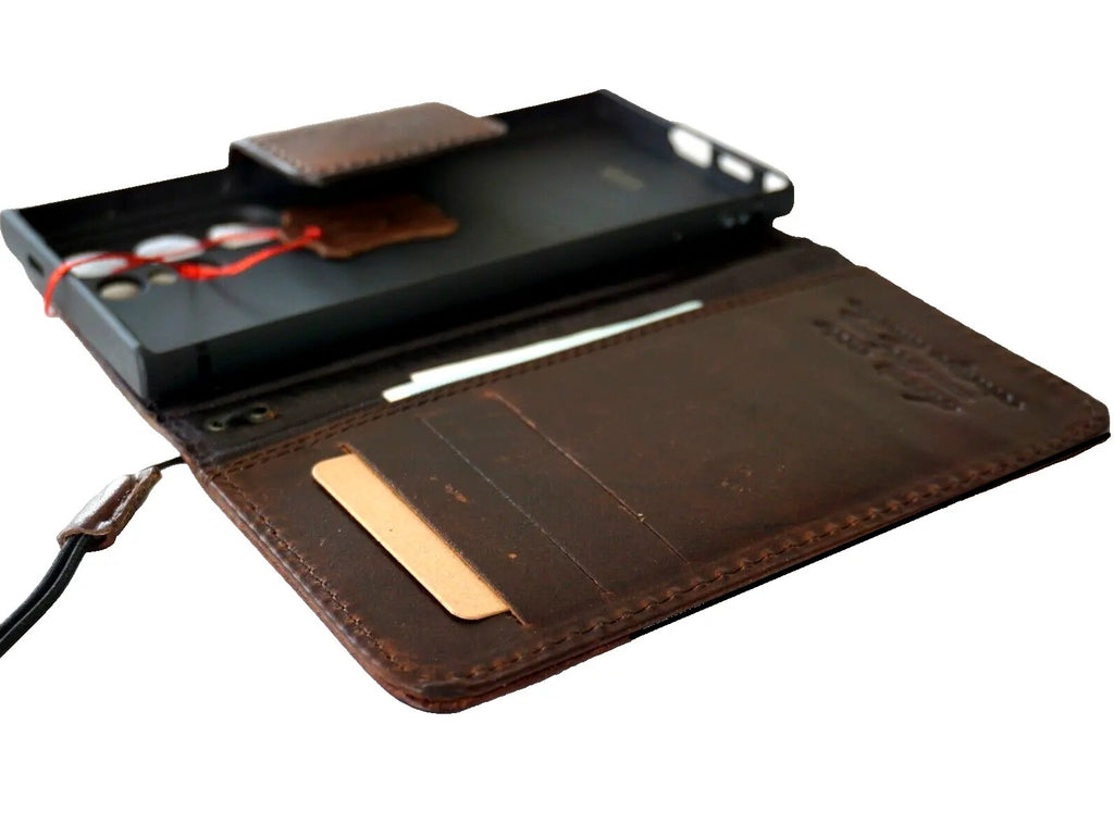 Handmade dark brown leather phone case with book wallet design for Samsung Galaxy S24 Ultra, includes magnetic closure and wireless charging.
