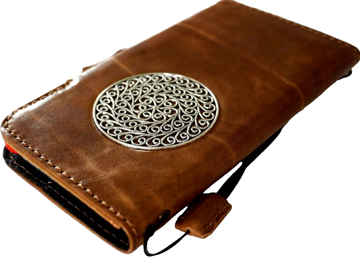 Handmade genuine leather phone case for iPhone models with vintage style, credit card slots, magnetic clasp, and full grain leather.