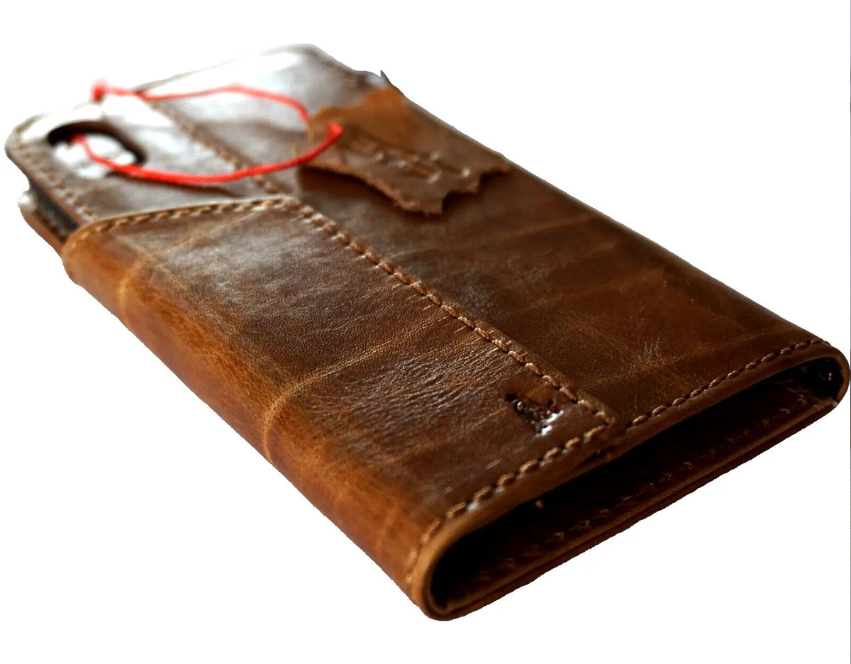 Handmade leather phone case by DAVISCASE for iPhone 11-15 Pro Max, with vintage style, credit card slots, and magnetic closure.