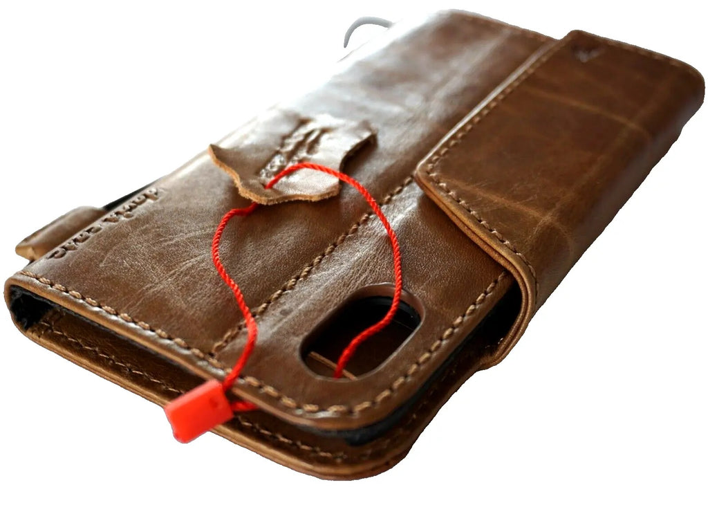 Handmade DAVISCASE genuine leather phone case with vintage wallet style, credit card slots, and magnetic closure for iPhone models.