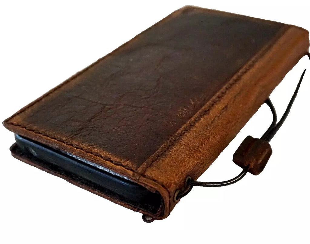 Genuine leather DAVISCASE wallet case for Google Pixel 10, 6, 7, 8, 9 Pro XL with book style design and polished finish.