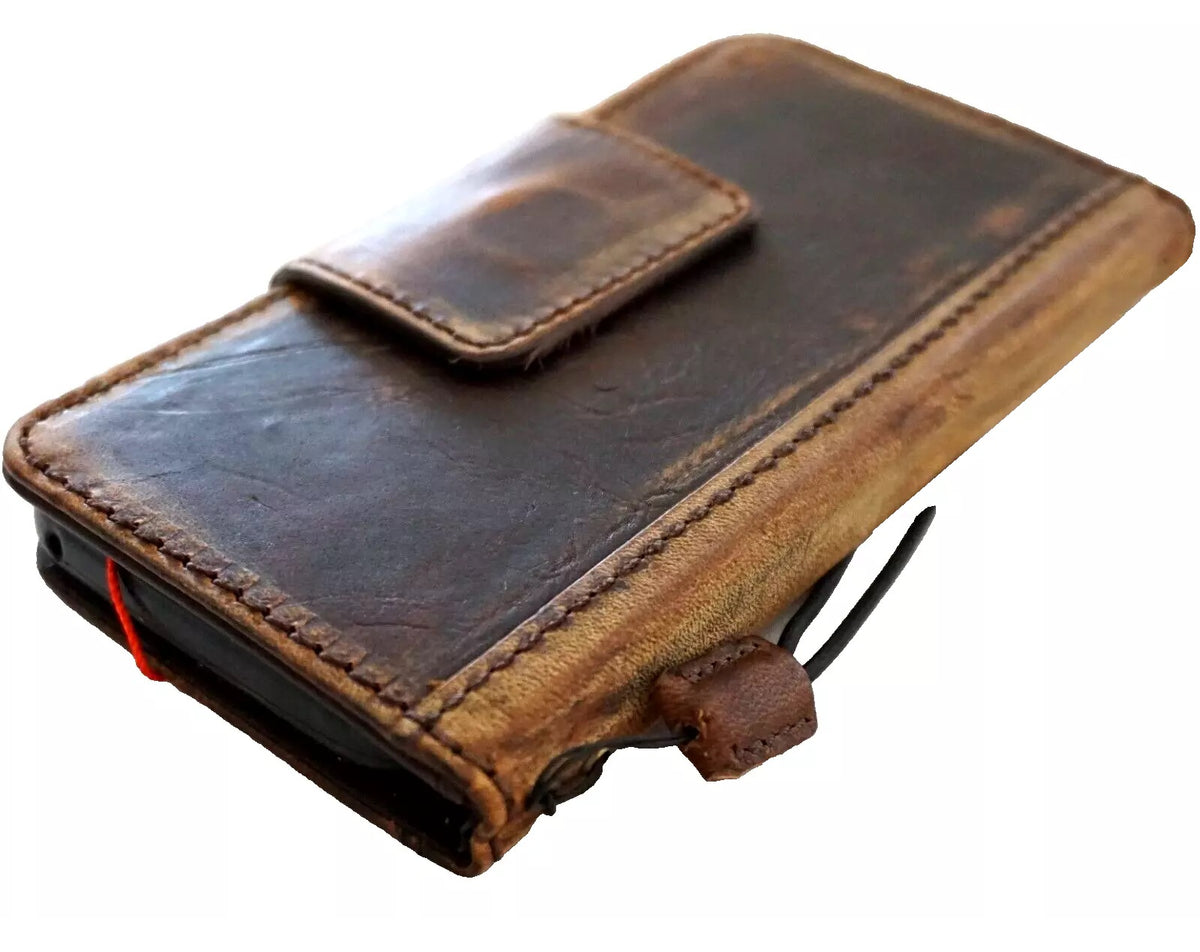 Genuine leather Google Pixel phone case by DAVISCASE featuring a book wallet style with magnetic closure and retro cross design.
