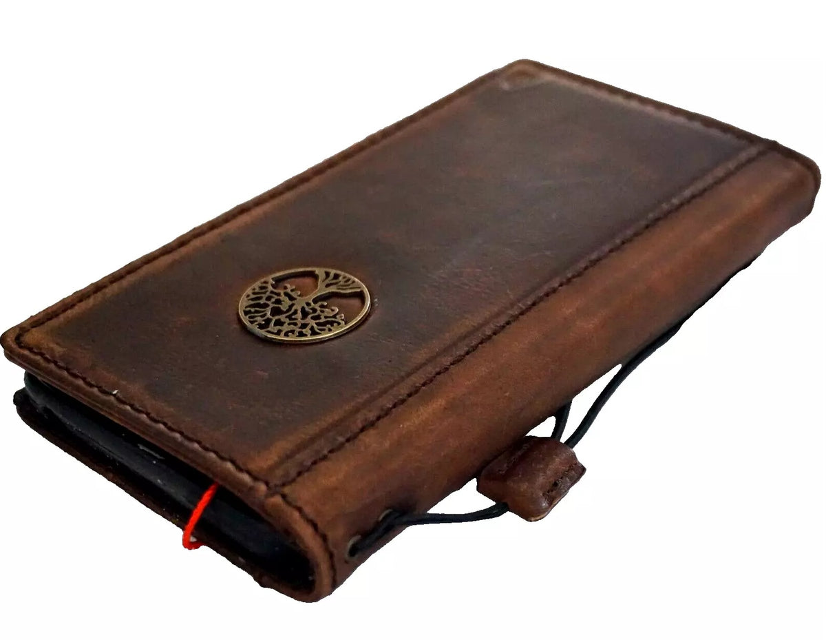 Genuine leather Google Pixel 7 Pro case by DAVISCASE with Tree of Life design, featuring a wallet stand and vintage style.