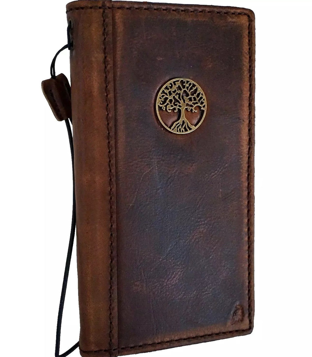 Handmade genuine leather phone case for iPhone 11-15 Pro Max, vintage-style with Tree of Life design and craft wallet features.