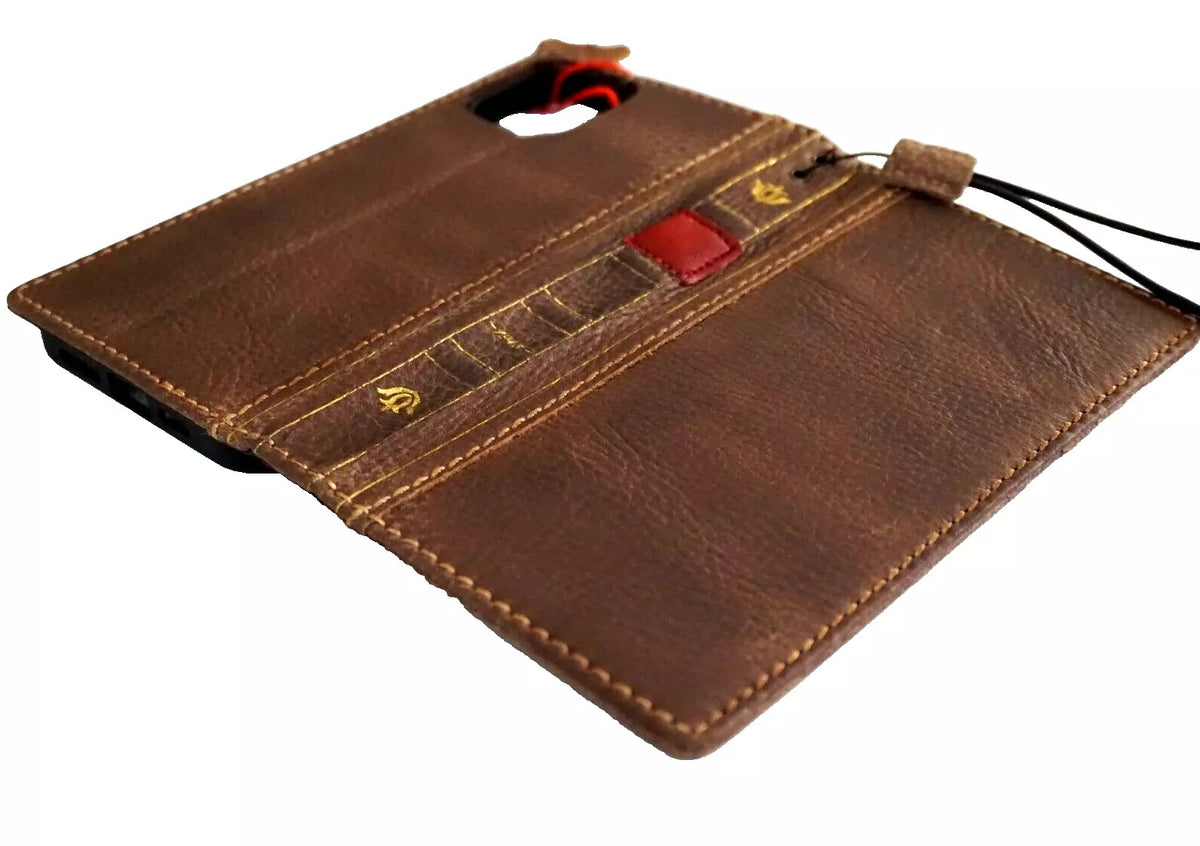 Genuine leather Google Pixel case by DAVISCASE, book-style wallet with vintage Bible-inspired design, for Pixel 10, 9, 8, 7, and 6 models.