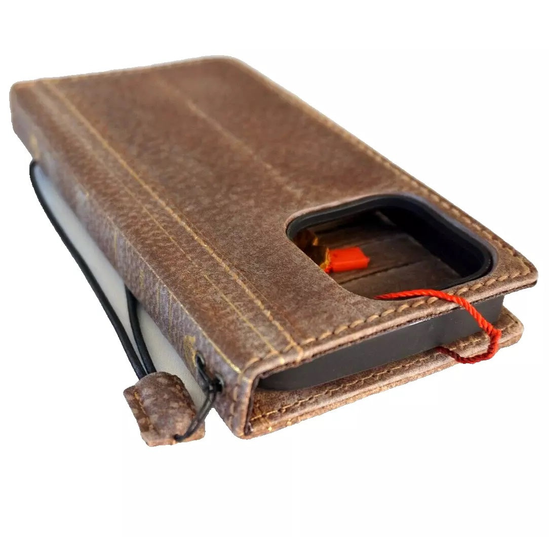 Handmade genuine leather phone case for iPhone models, featuring vintage-style design and Bible craft details by DAVISCASE.