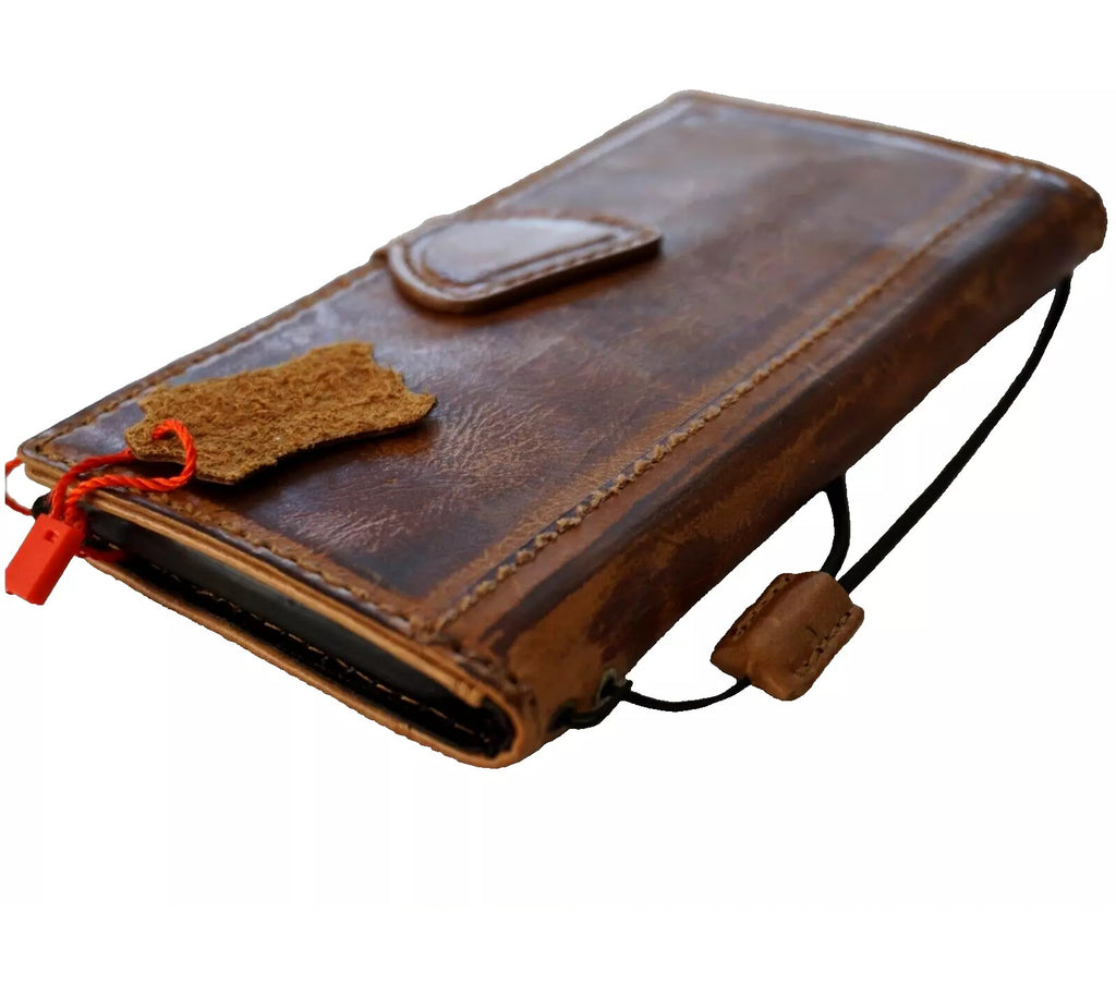 Handmade genuine leather phone case by DAVISCASE for iPhone 12-15 Pro Max, featuring a smoked shark design and magnetic wallet style.