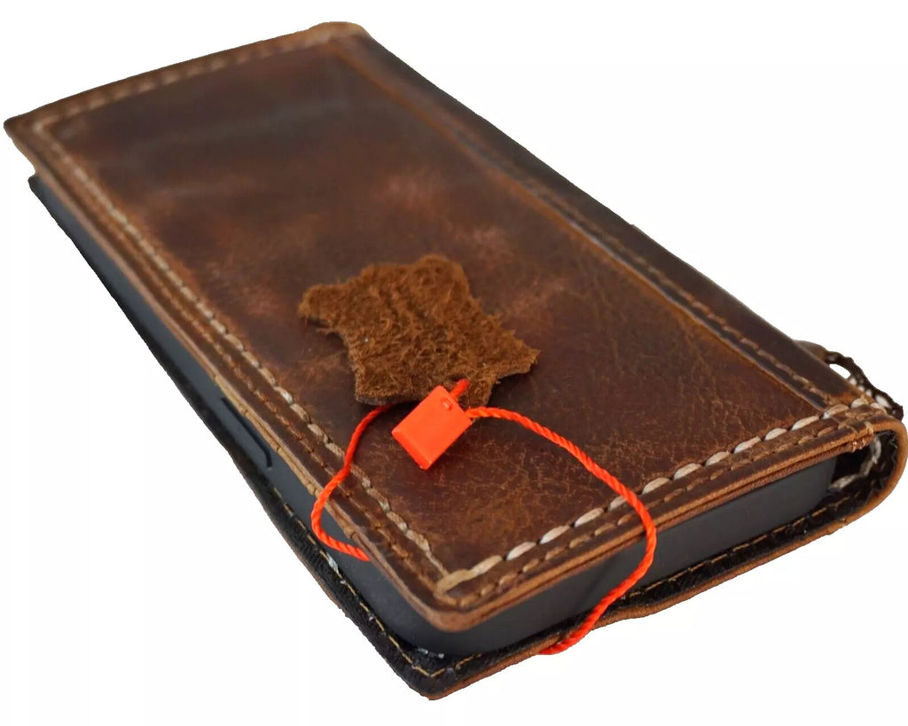 Handmade genuine leather phone case for iPhone 12-16 Pro Max, 8 Plus, featuring a wallet-style book cover by DAVISCASE.