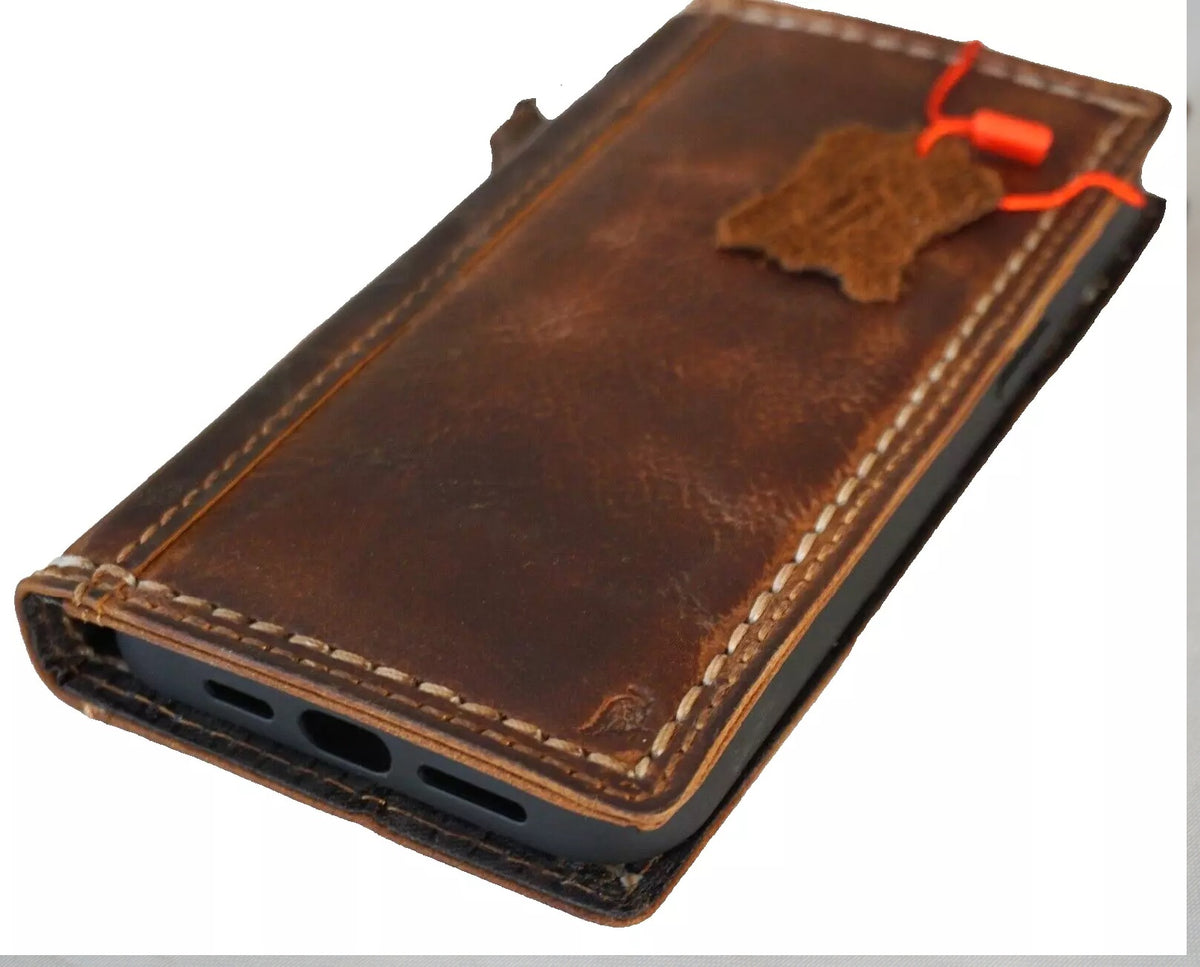 Handmade genuine leather phone case for iPhone models 8 to 16 Pro Max, featuring a wallet-style book cover by DAVISCASE.
