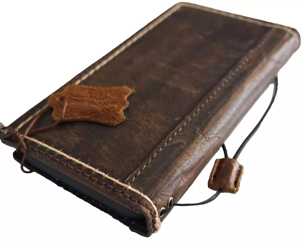 Handmade genuine leather phone case for Galaxy S22, S21, S20, S23, S24, S25 Edge, Note 20, 21 with wallet and coarse seam details.
