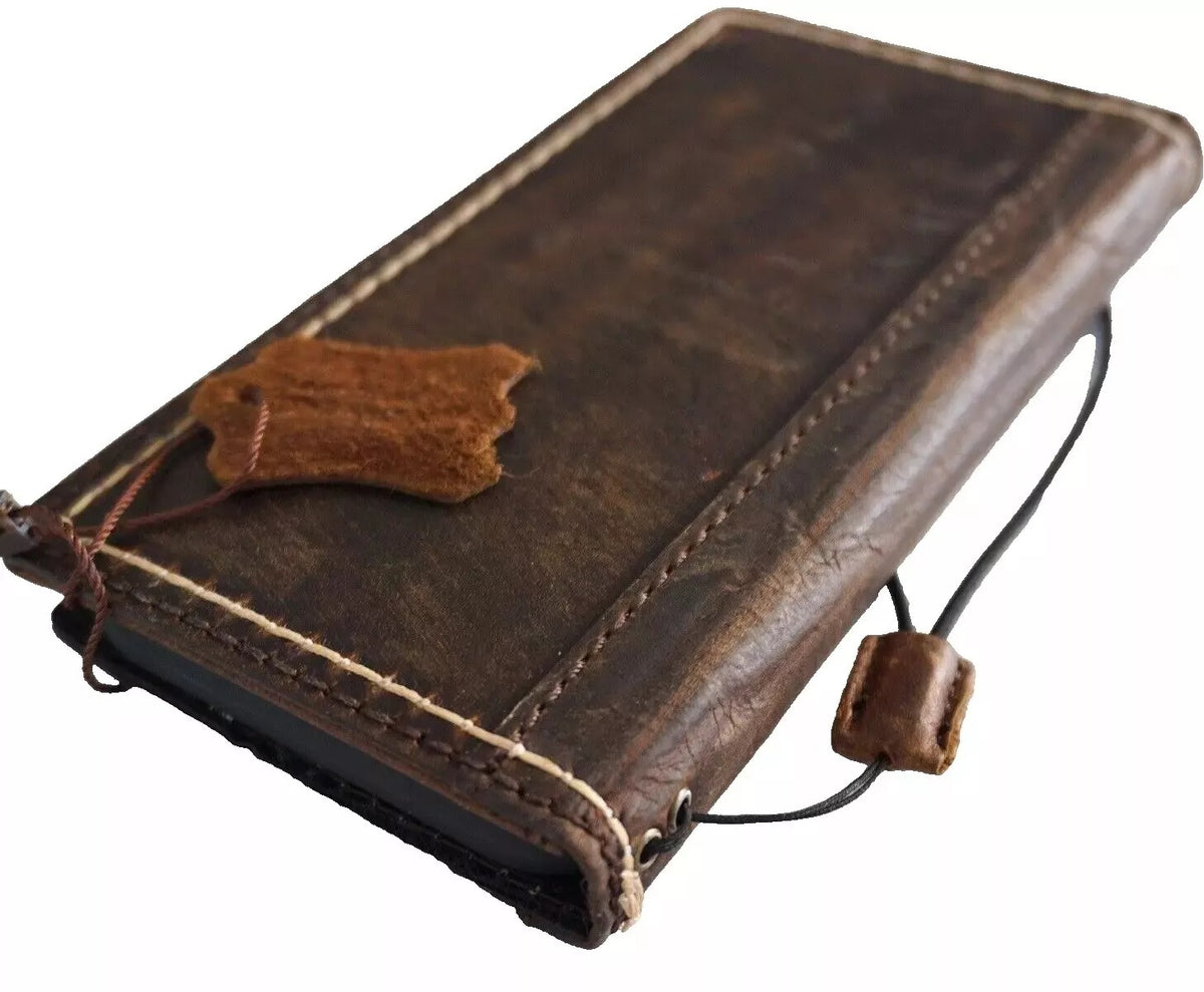 Handmade genuine leather phone case for Galaxy S22, S21, S20, S23, S24, S25 Edge, Note 20, 21 with wallet and coarse seam details.