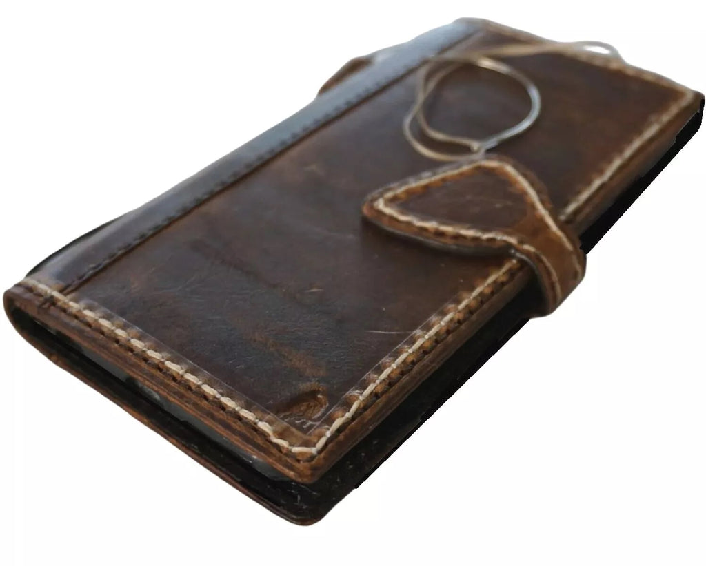 Handmade genuine leather wallet case for iPhone 12 to 16, featuring magnetic closure, sew hand-oiled finish, and brand DAVISCASE.