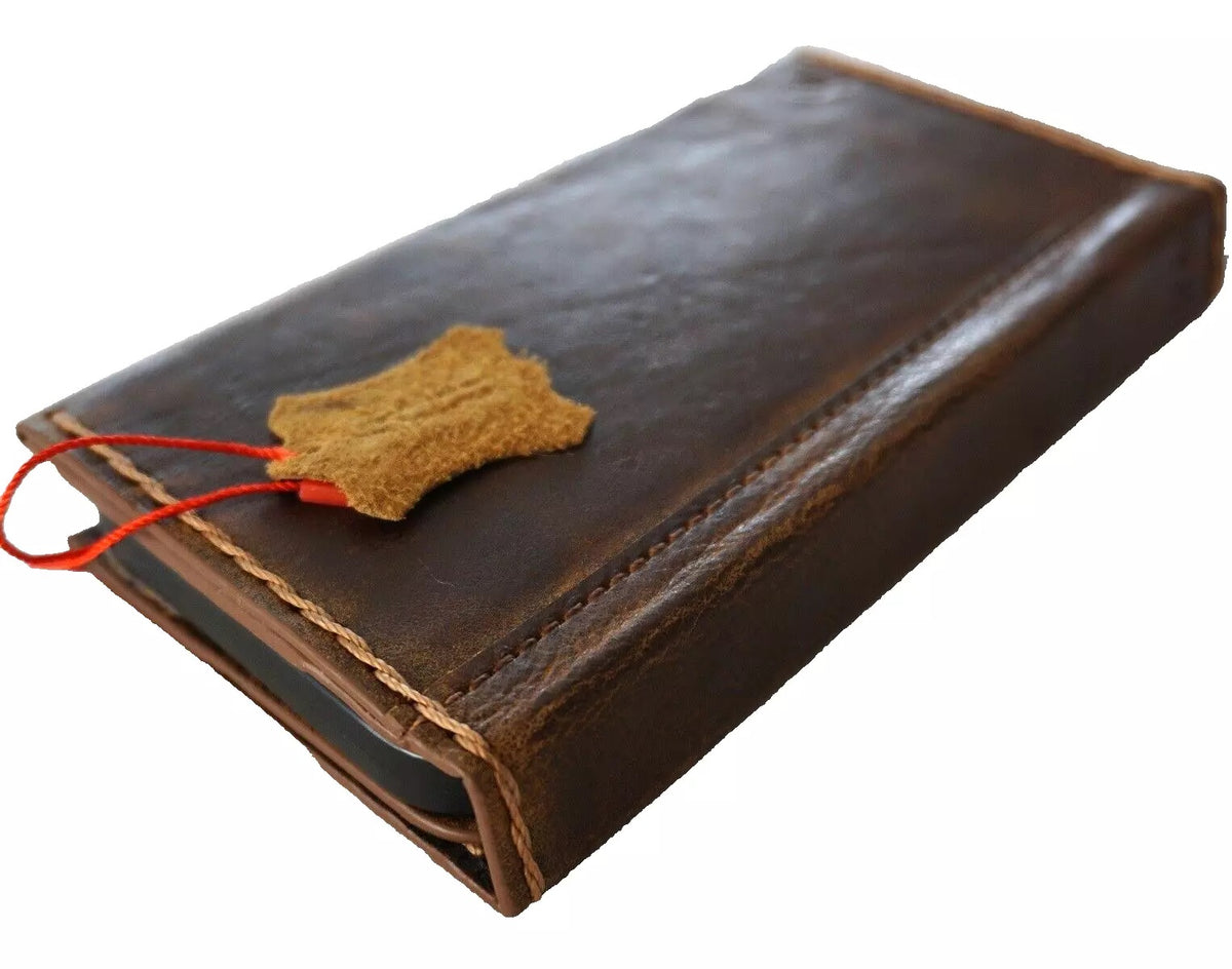 Handmade genuine leather wallet phone case for Apple iPhone 16, 14, 15, 17 Pro Max by DAVISCASE, featuring a luxurious book cover design.