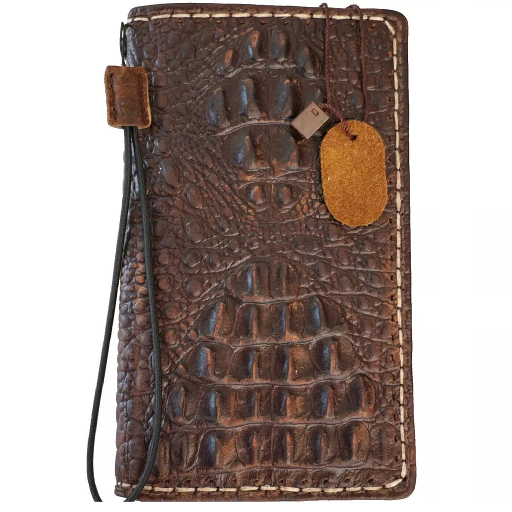 Genuine leather fold wallet cover for Google Pixel phones, vintage crocodile style in black with card slots and protective design by DAVISCASE.