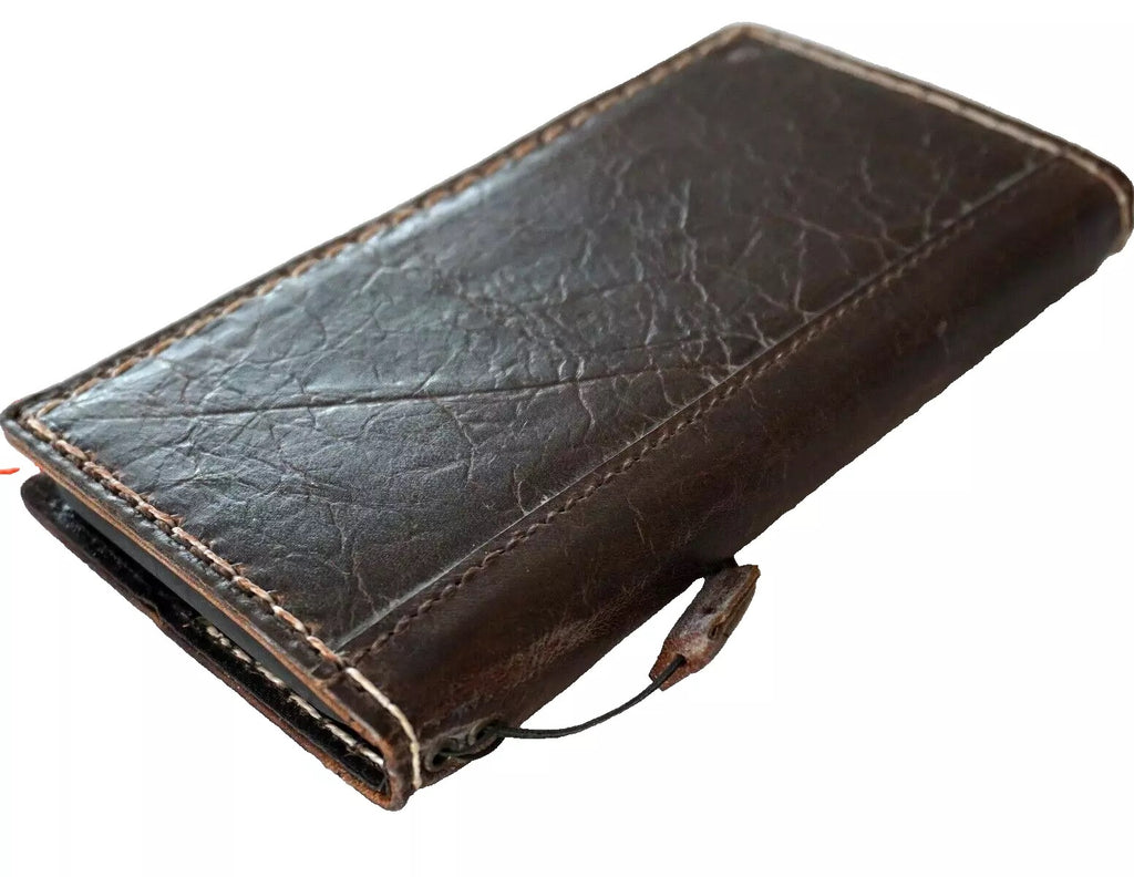 Handmade genuine leather phone case for iPhone models with wallet and book cover design, featuring a luxurious, mini, wrinkled finish.