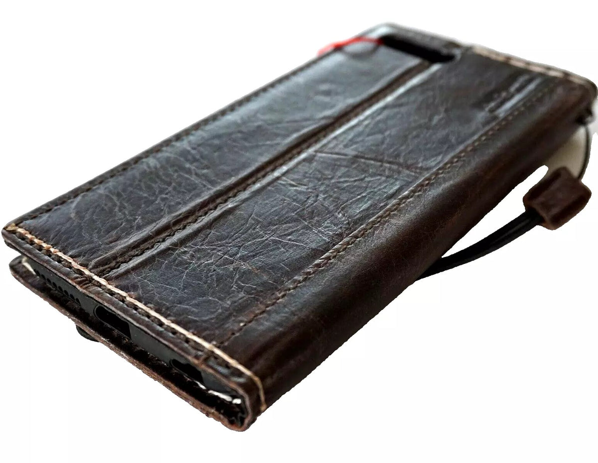 Handmade genuine leather phone case for iPhone 12-16 Pro Max, wallet-style book cover with a luxury, textured finish.