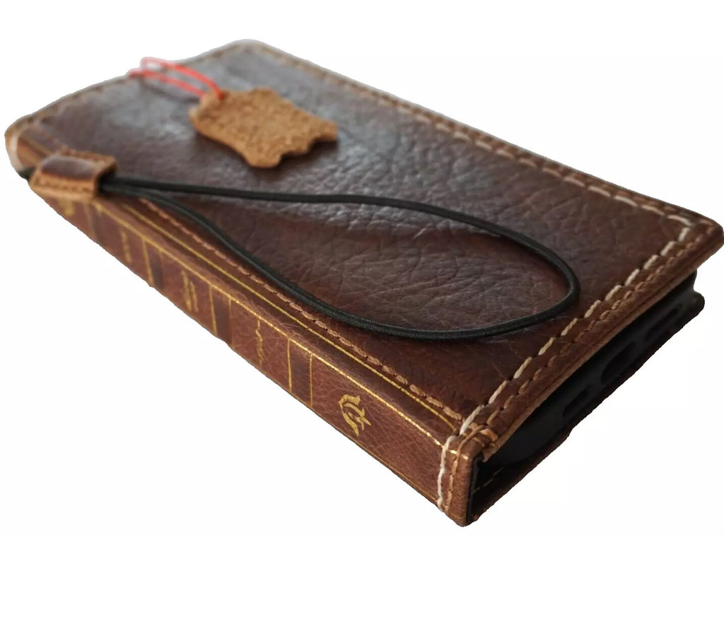 Handmade genuine leather phone case for iPhone 12 to 17 Pro Max, SE, XS, with wallet and Bible-style design in tan color.