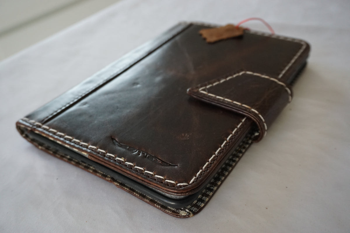 Handmade genuine leather case for Apple iPad Mini 3-6, DAVISCASE luxury dark brown cover with hand-sewn details.