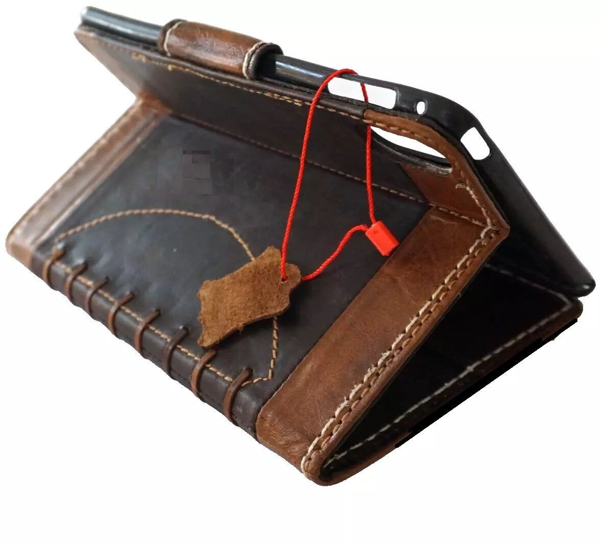 Genuine leather handmade iPad Mini case by DAVISCASE, featuring a luxury football-style hand-sewn design for models 3 to 6.