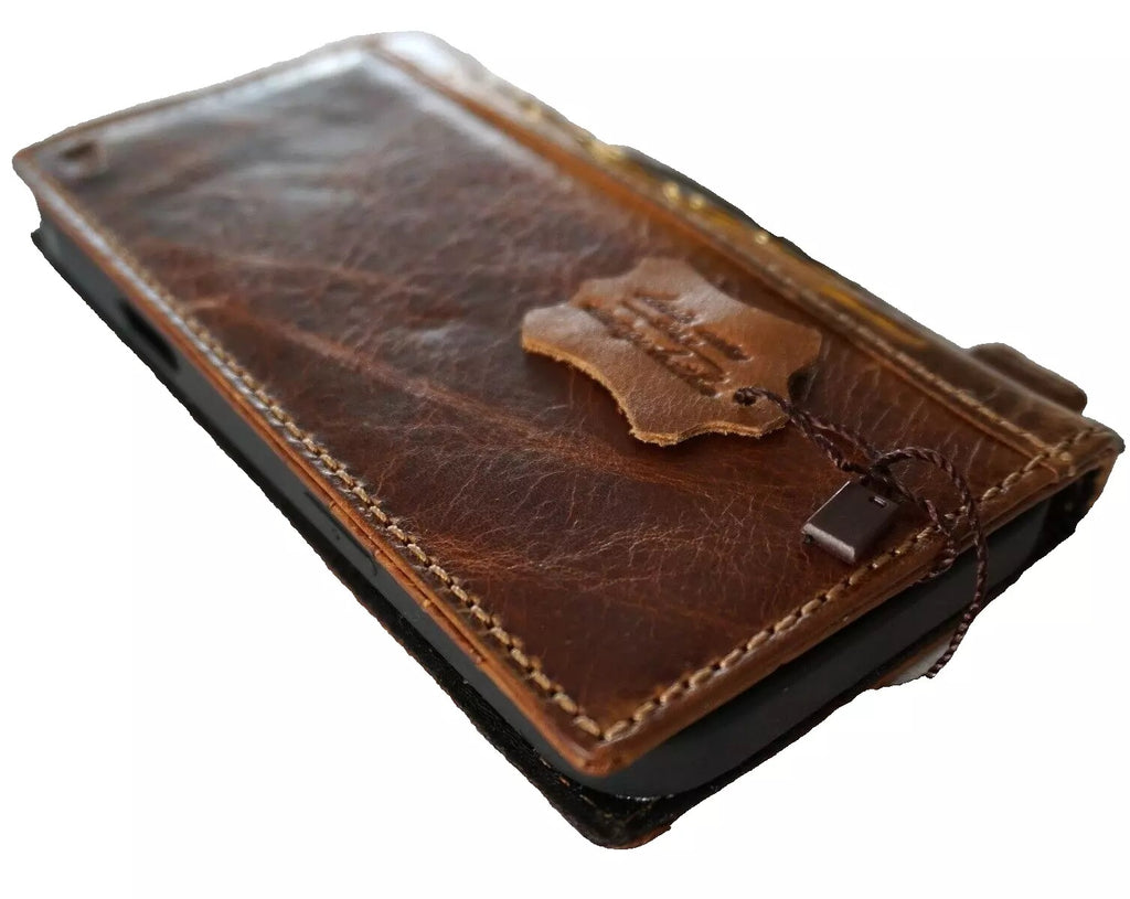 Handmade genuine leather phone case for iPhone 12-16 Pro Max with double stitching and gold stamp by DAVISCASE.