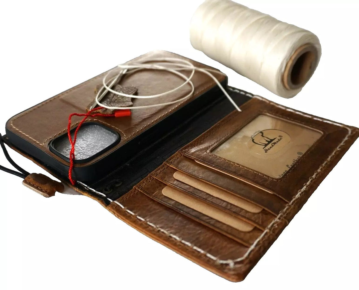 Handmade genuine leather wallet case for iPhone 12-16 Pro Max, featuring removable section, sewing details, in tan color.