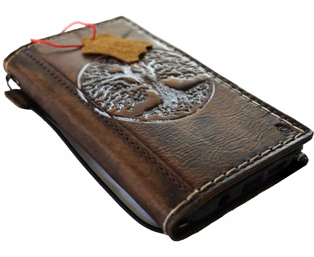 Handmade genuine leather phone case for iPhone 12-16 Pro Max by DAVISCASE with embossed Tree of Life design, oiled finish.