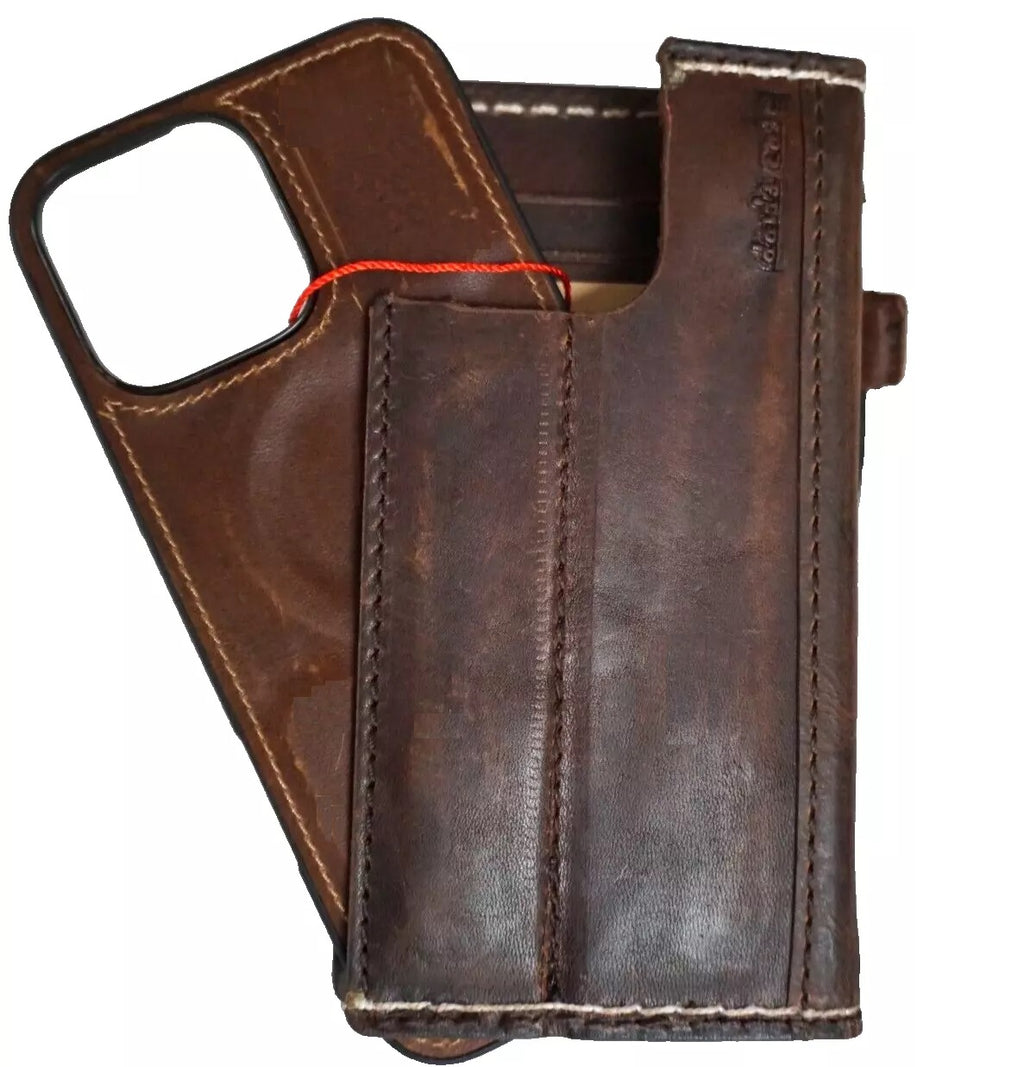 Handmade genuine leather phone case for iPhone 12-16 Pro Max with removable wallet by DAVISCASE, featuring detailed sewing and craftsmanship.