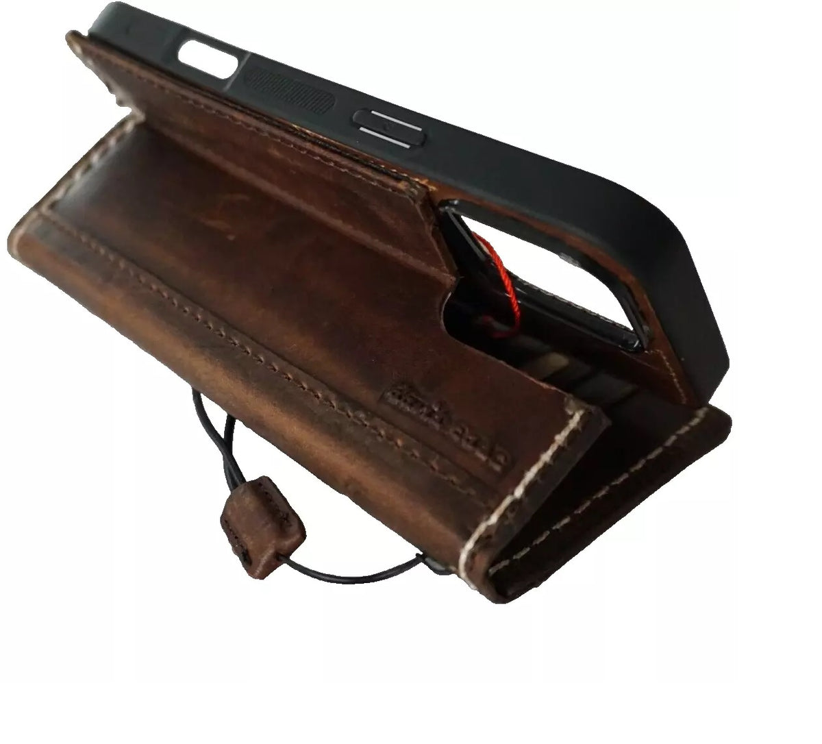 Handmade genuine leather phone case for iPhone 13-16 Pro Max with wallet features, crafted by DAVISCASE.