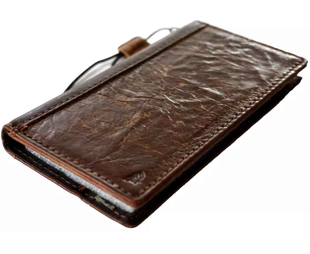 Handmade genuine leather wallet phone case for iPhone 16, 12, 13, 14, 15 Pro Max, with a textured, luxurious design.