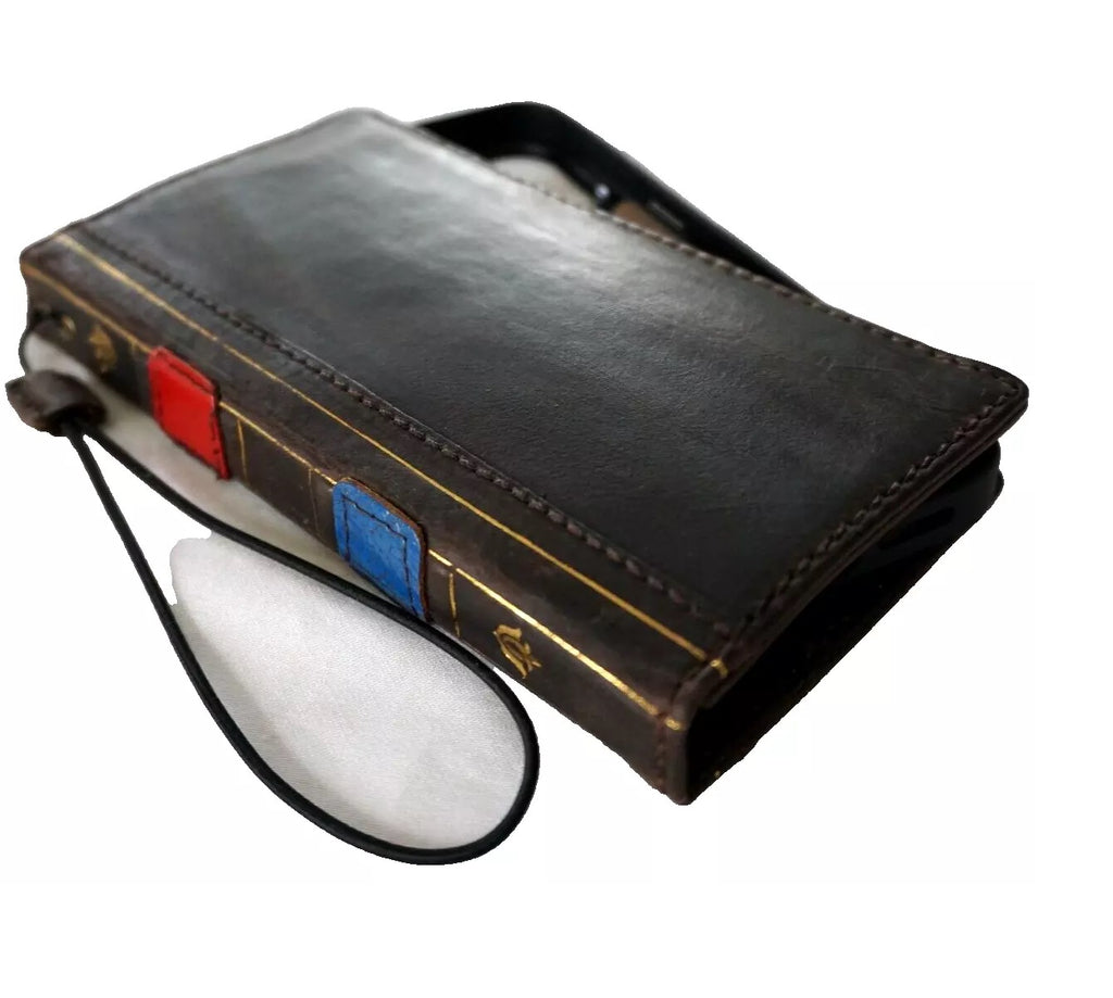 Blue genuine leather Google Pixel wallet case by DAVISCASE with fold design, hand-crafted, showing the textured leather and card slots.