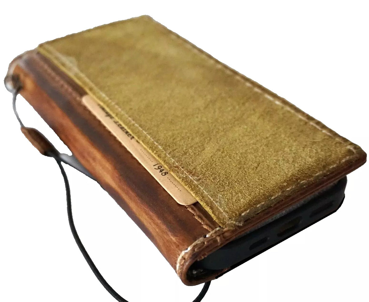 Green genuine leather fold wallet case for Google Pixel phones, handcrafted by DAVISCASE with sewing details and card slots.