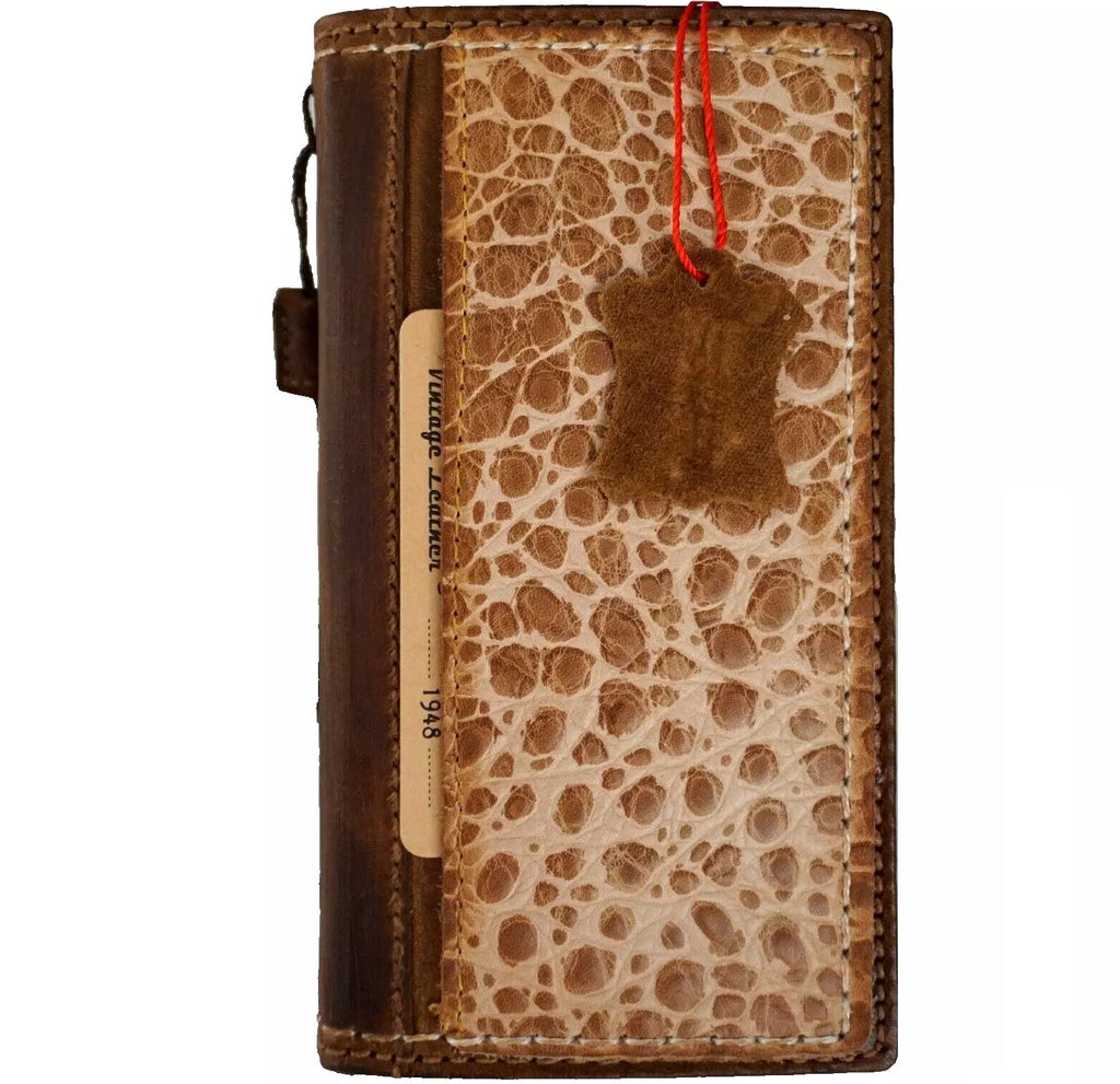 Handmade genuine leather phone case for iPhone 13 to 16 Pro Max with removable wallet, crafted by DAVISCASE, featuring detailed sewing.