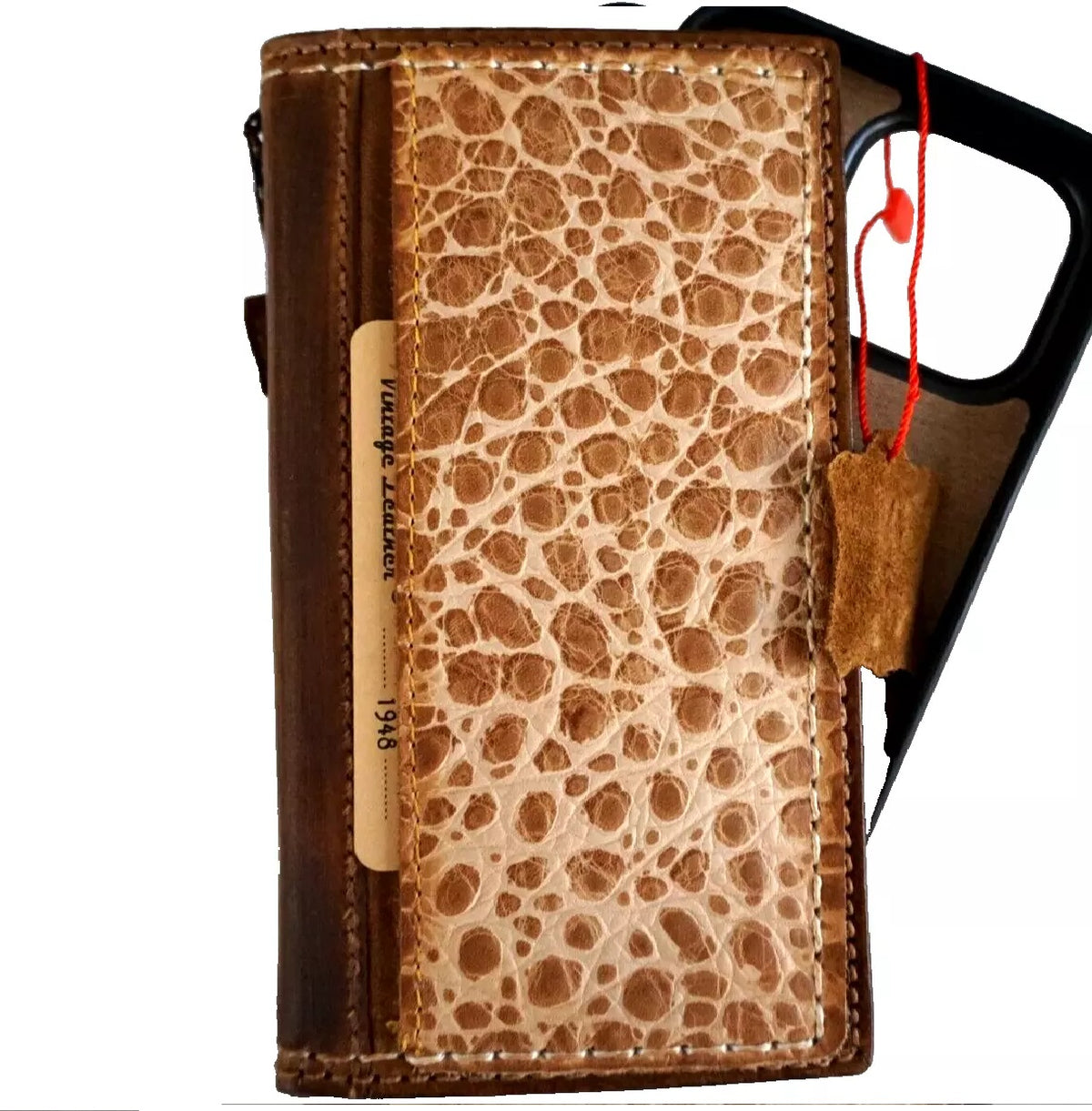 Handmade genuine leather phone case for iPhone 12-16 Pro Max with wallet features, crafted by DAVISCASE, showing detailed sewing.