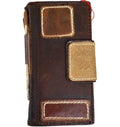 Handmade genuine leather phone case by DAVISCASE for iPhone models, with magnetic closure and limited edition patches.