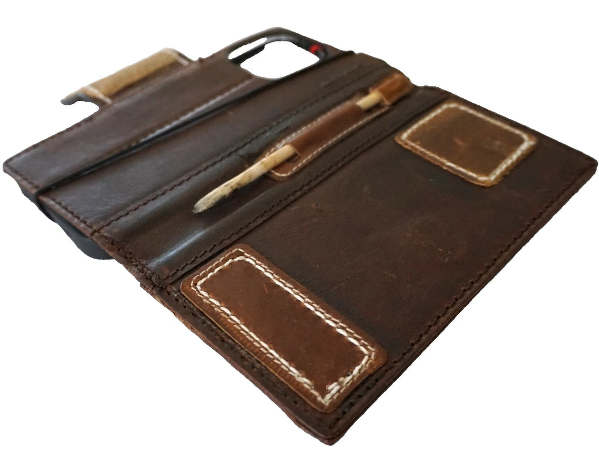 Handmade genuine leather phone case for iPhone models, with magnetic closure and limited edition patches by DAVISCASE.