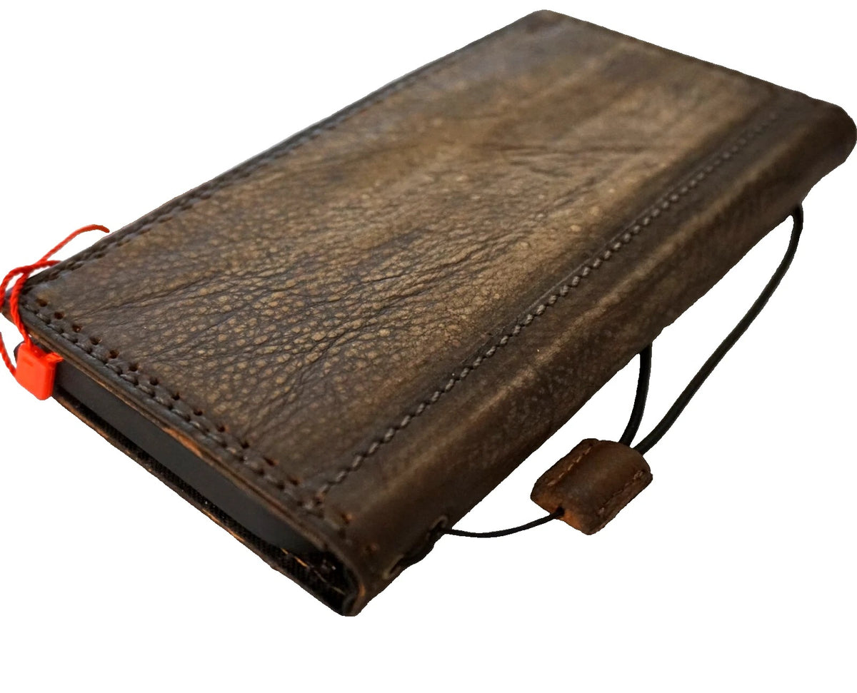 Handmade genuine leather phone case by DAVISCASE for iPhone 12 to 17 Pro Max, featuring a wallet-style air book cover.
