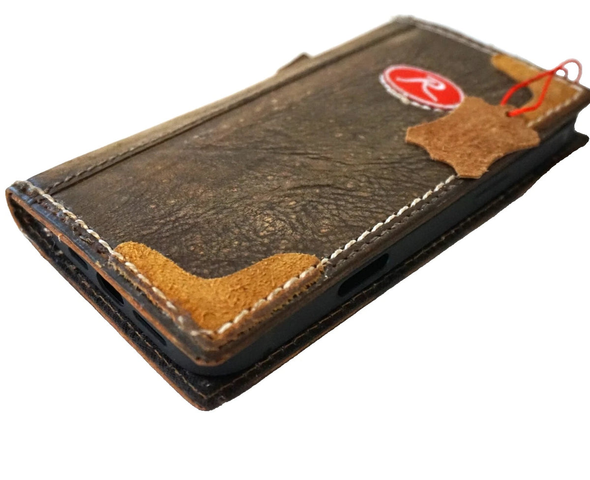 Handmade genuine leather wallet cover for Google Pixel phones, featuring a fold book design with card slots and precise cutouts.