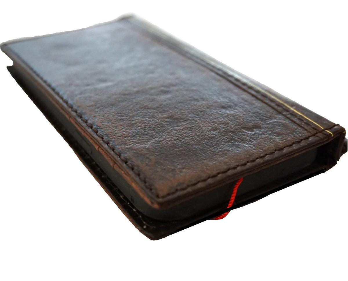 Handmade genuine leather phone case for iPhone 13-17 Pro Max Air Wallet Bible book cover by DAVISCASE, with detailed craftsmanship.