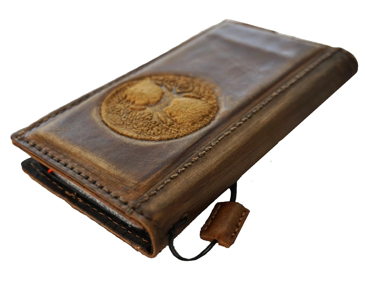 Handmade genuine leather phone case by DAVISCASE with Tree of Life design for iPhone 13-17 Pro Max and Air Wallet Book Cover style.